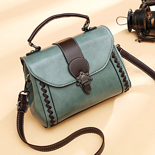 IELGY fashion wear-resistant rivet messenger handbag retro
