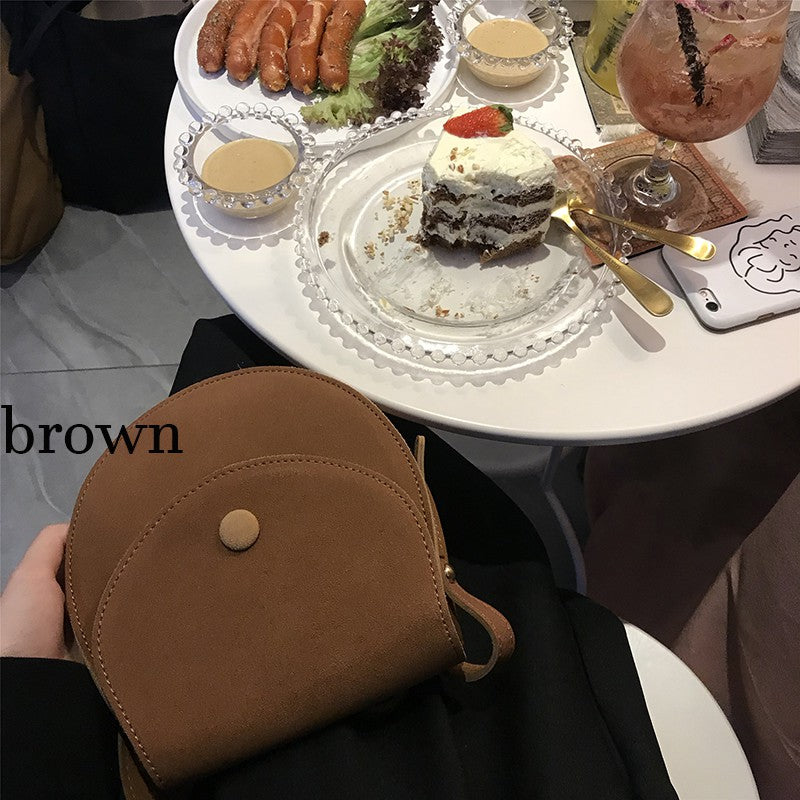 Wide-band solid-color flip semi-circular Messenger bag