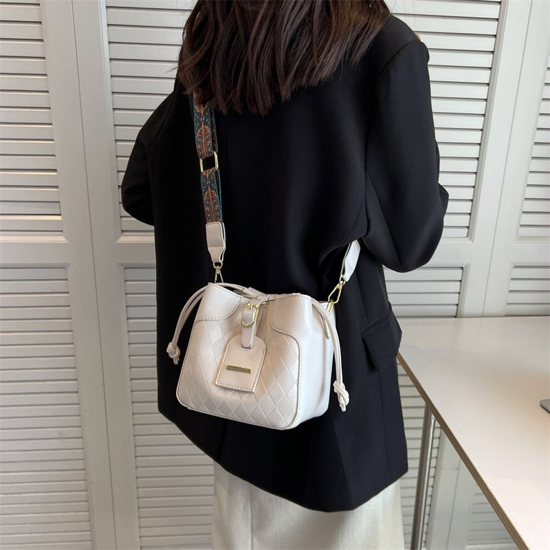IELGY women's vintage drawstring wide shoulder strap bucket messenger bag