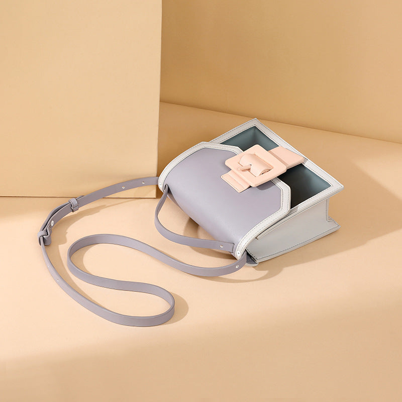 IELGY cross-body summer vitality High-class sense jelly bag fashion western style portable generous button exquisite style contrast color