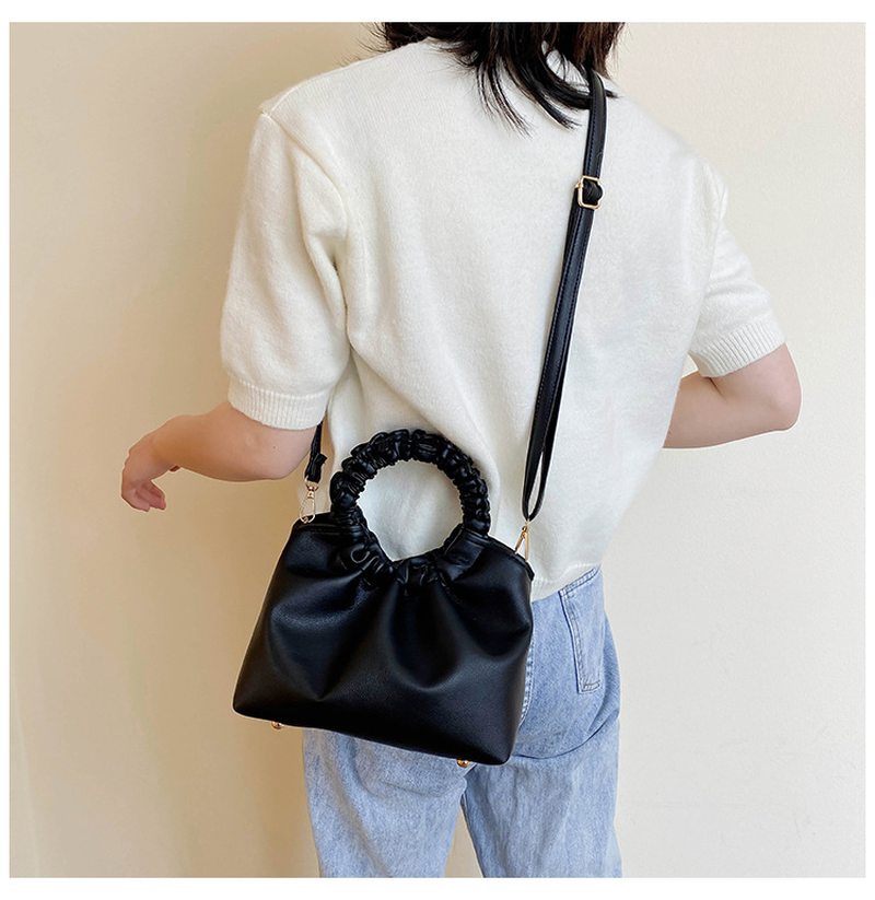 Plain color and retro fashion style handbag for women