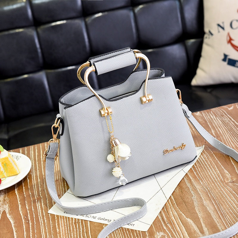 IELGY metal decoration elegant Korean style fashion stitching messenger large-capacity female bag