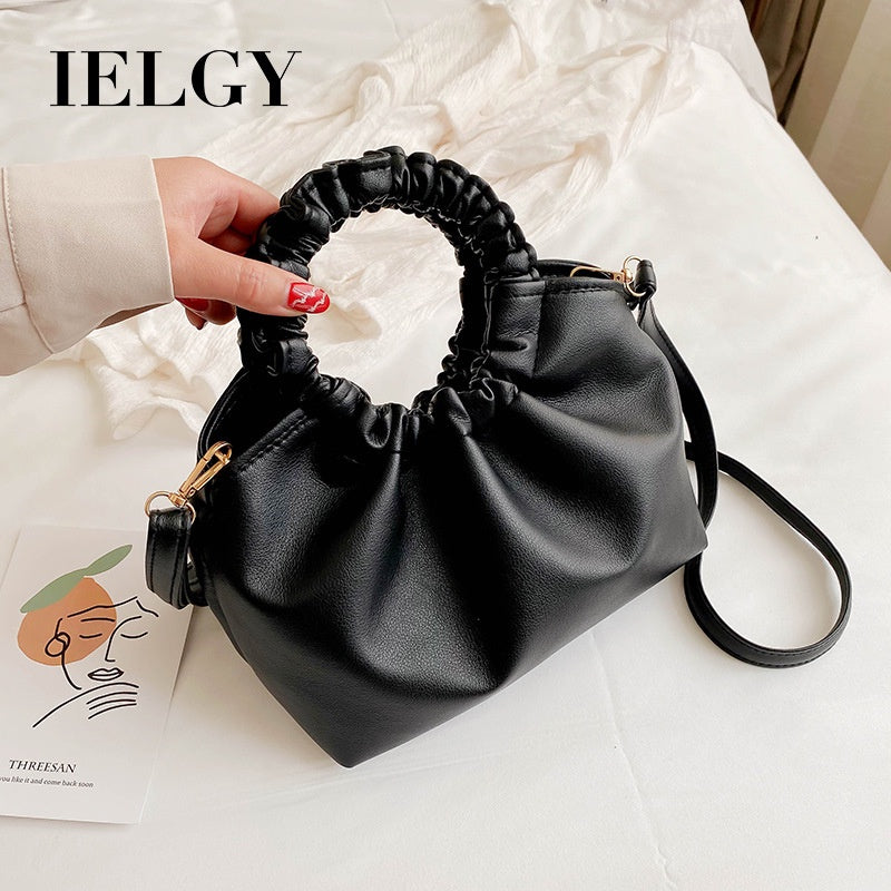 Plain color and retro fashion style handbag for women