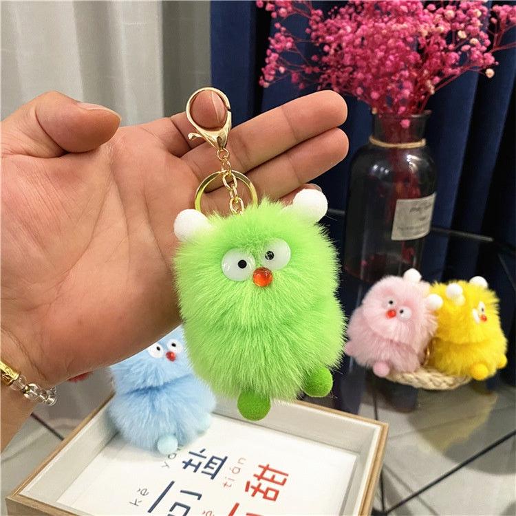 IELGY Cute cartoon little monster plush doll bag pendant