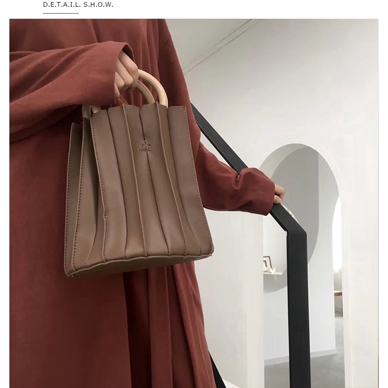 IELGY Korean three-dimensional pleated wooden ring bucket bag