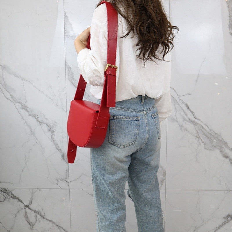 IELGY women's niche design wide shoulder strap half round saddle messenger bag