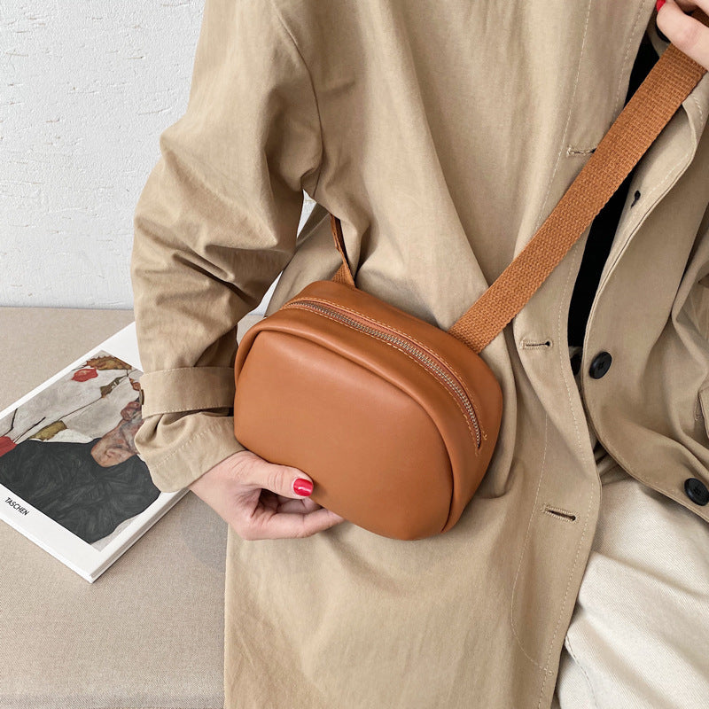 IELGY broadband Popular high-end oval smooth zipper woman's cute crossbody bag versatile one-shoulder
