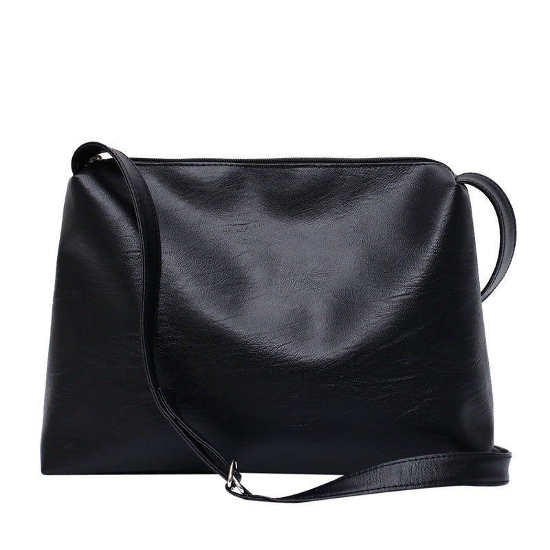 IELGY fashion versatile shoulder bag postman Korean version Hong Kong style large capacity cool messenger solid color