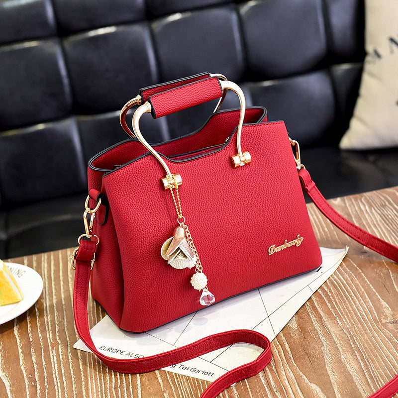 IELGY metal decoration elegant Korean style fashion stitching messenger large-capacity female bag