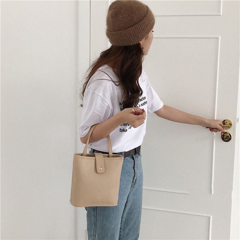 IELGY Versatile Bucket PU One shoulder Crossbody Simple Black Women's bag Portable