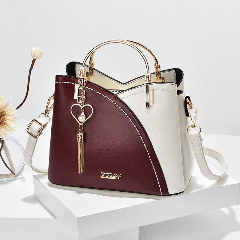 IELGY trendy metal letters large-capacity fashion accessories color-blocking messenger bag