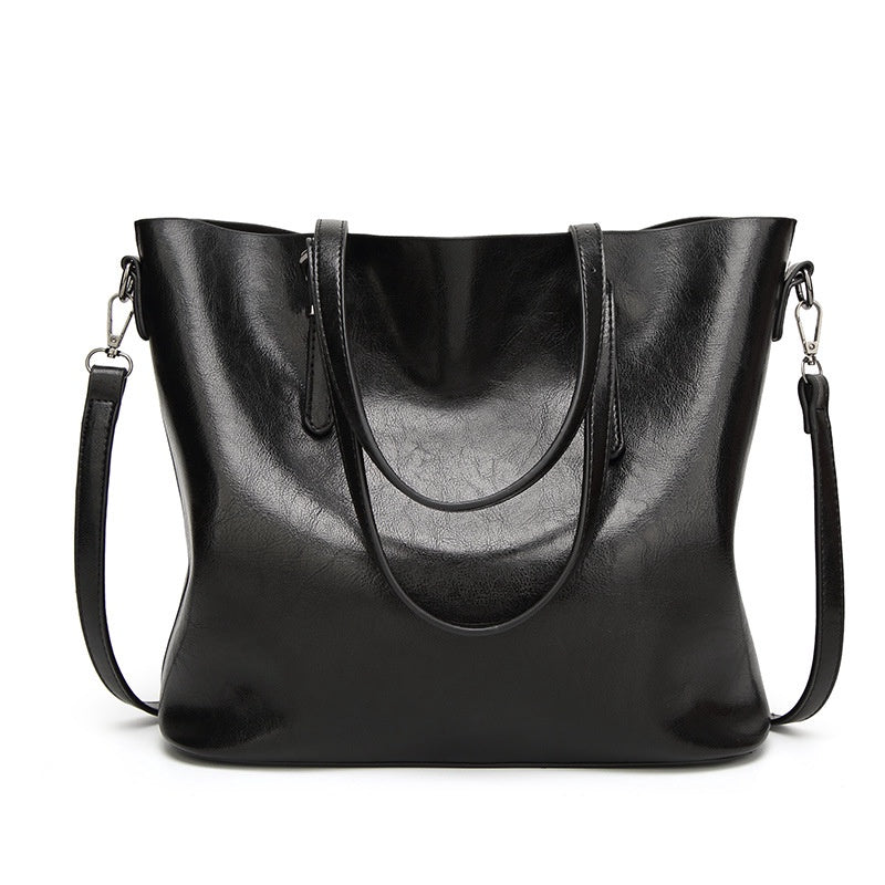 IELGY New spot handbags Simple shoulder slung women's bag