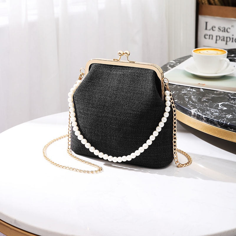 IELGY one-shoulder messenger shell type versatile fashion cosmetic bag