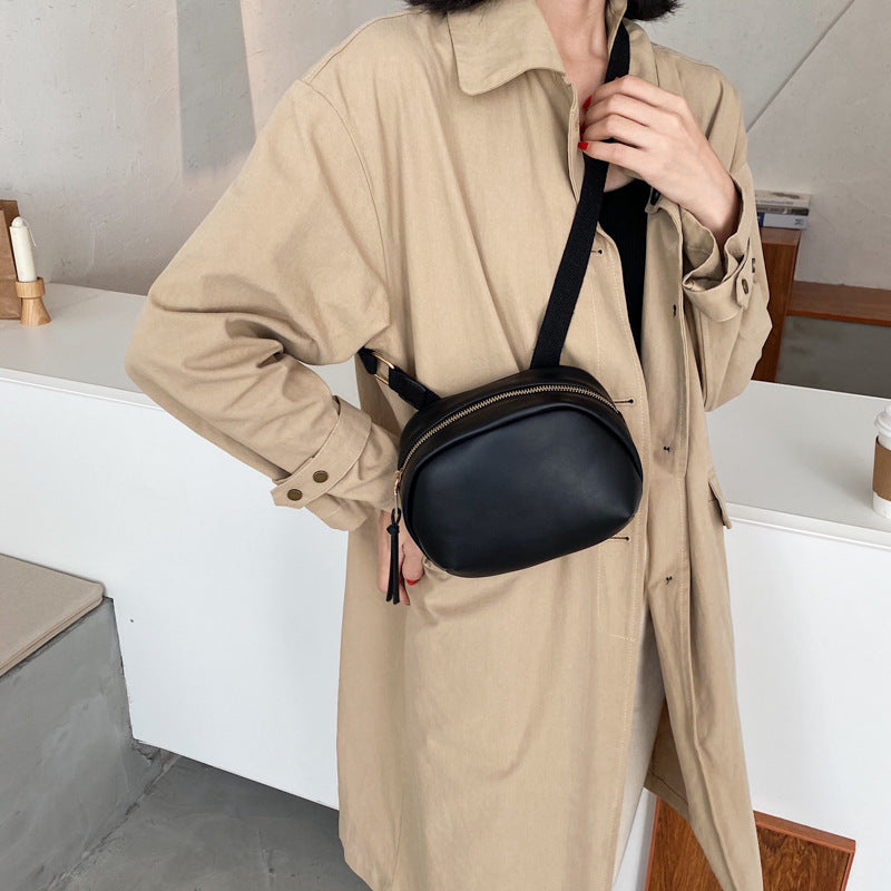 IELGY broadband Popular high-end oval smooth zipper woman's cute crossbody bag versatile one-shoulder