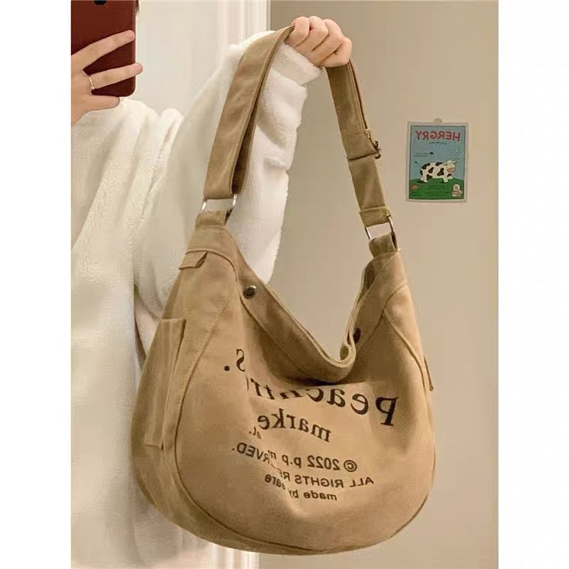 IELGY women's retro large capacity class messenger canvas bag