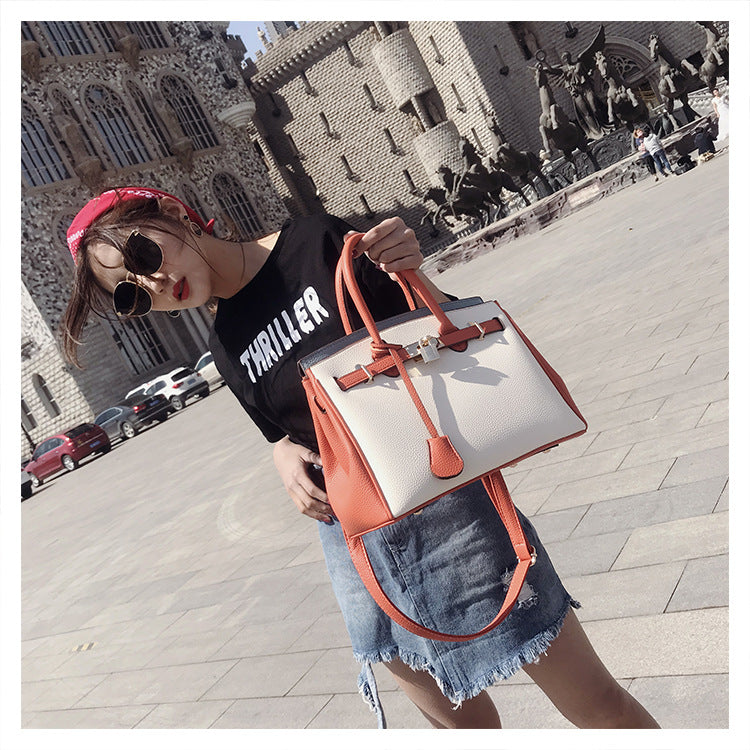IELGY versatile large capacity portable litchi pattern one shoulder platinum Women's messenger bag casual fashion