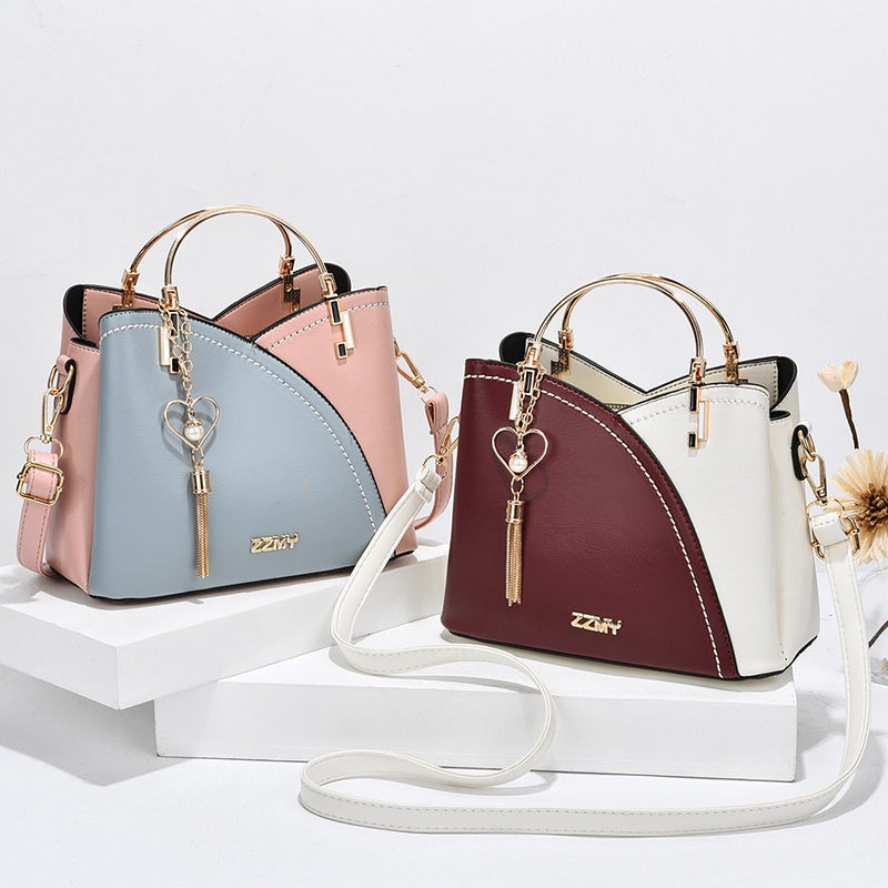 IELGY trendy metal letters large-capacity fashion accessories color-blocking messenger bag