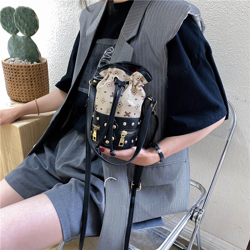 IELGY Women's bag bucket crossbody casual PU retro fashion rivet black all-match