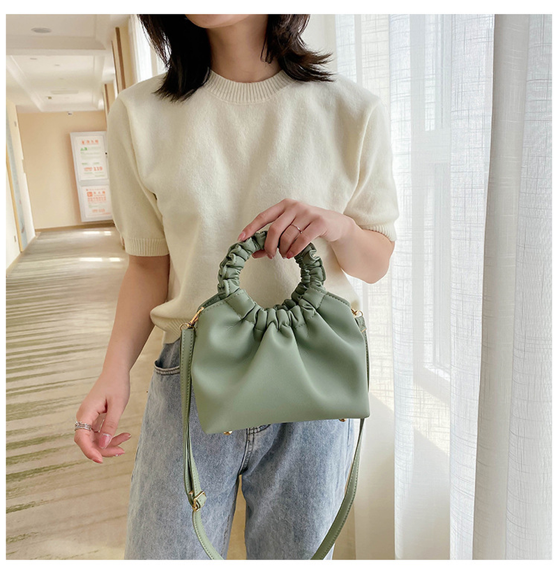 Plain color and retro fashion style handbag for women