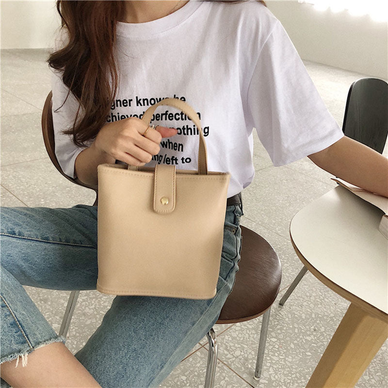IELGY Versatile Bucket PU One shoulder Crossbody Simple Black Women's bag Portable