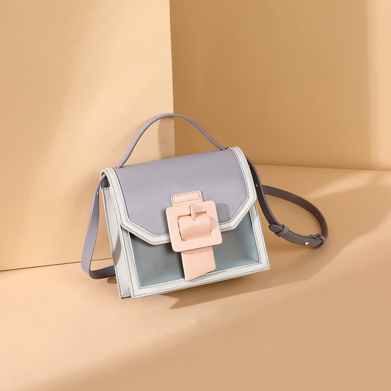 IELGY cross-body summer vitality High-class sense jelly bag fashion western style portable generous button exquisite style contrast color