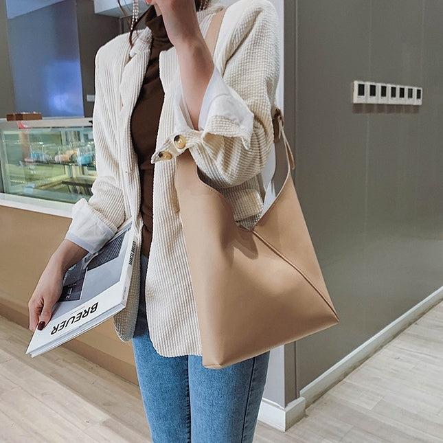 Ielgy large bag women's new 2020 retro simple Korean bucket bag with INS large capacity Single Shoulder Messenger mother bag