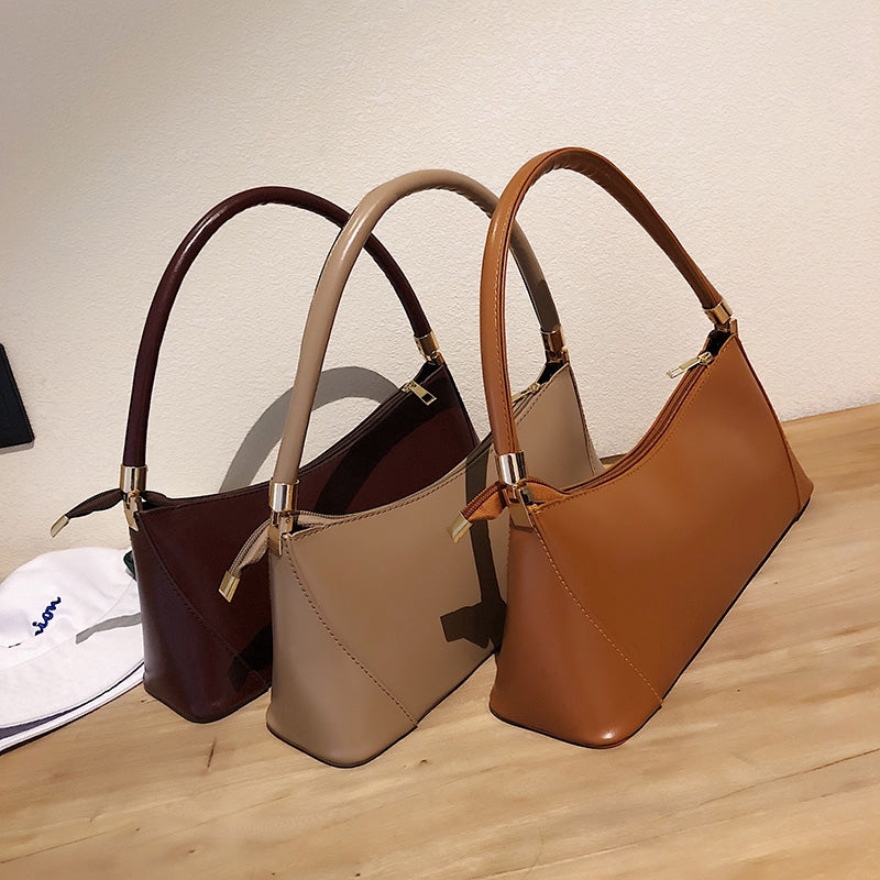 IELGY  Textured bag girl 2020 spring/summer new small commuter hundred with a solid color law stick under the bag one-shoulder handbag tide