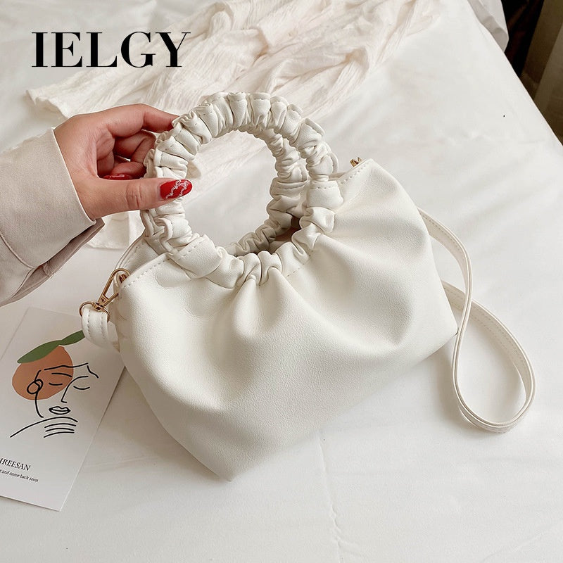 Plain color and retro fashion style handbag for women