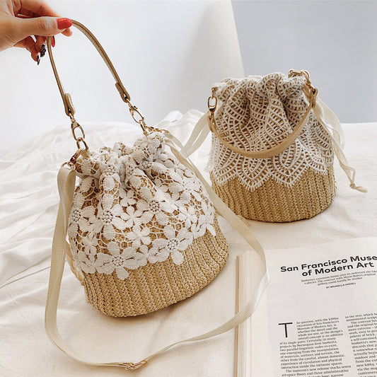 IELGY One shoulder Commuting Bucket type Solid color Rattan Lace Soft surface Women's messenger bag Casual