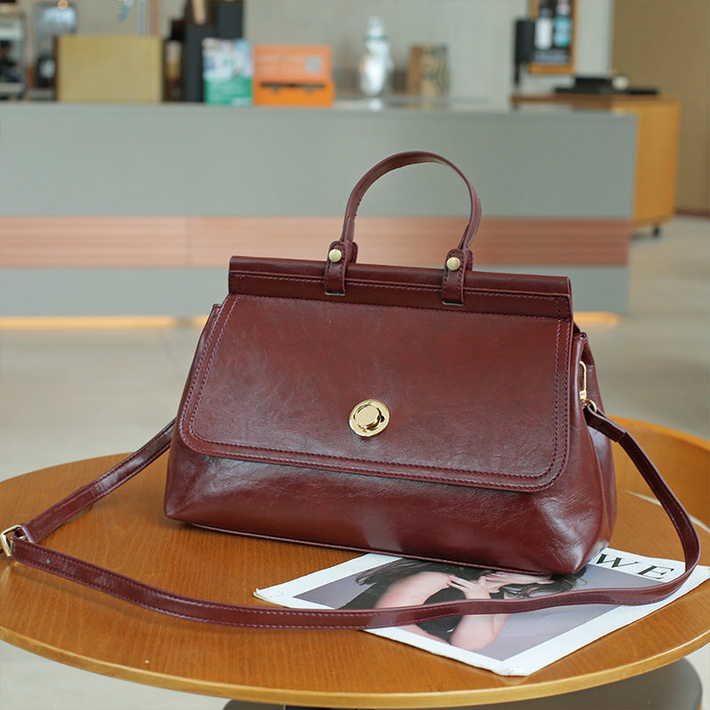 IELGY retro daily commuting large capacity texture messenger messenger bag women