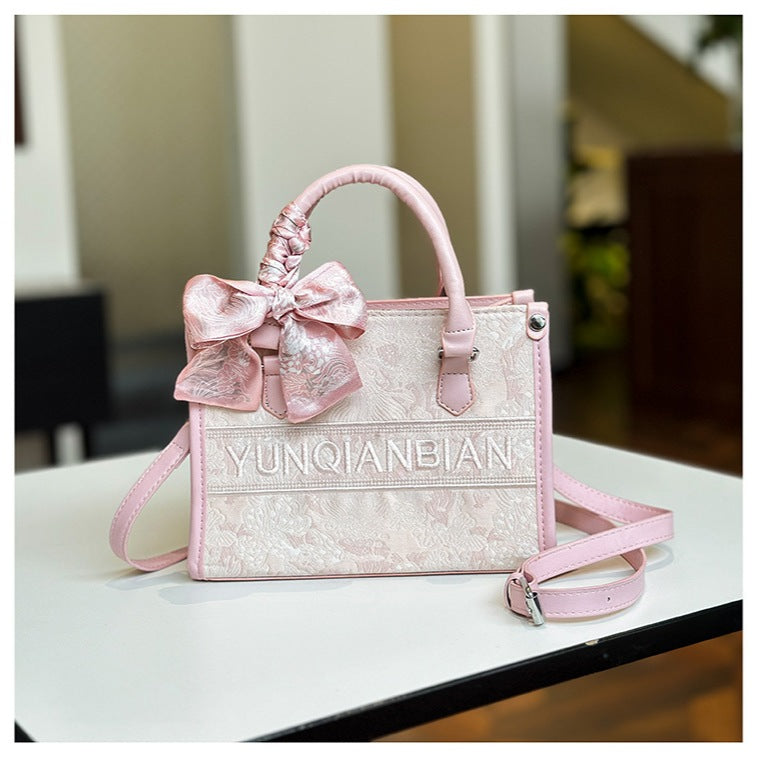 Ielgy Commuter Tote Bag High-End Pattern Embroidery Portable One-Shoulder Diagonal Shopping Bag (Ribbon Style Random Shipping)