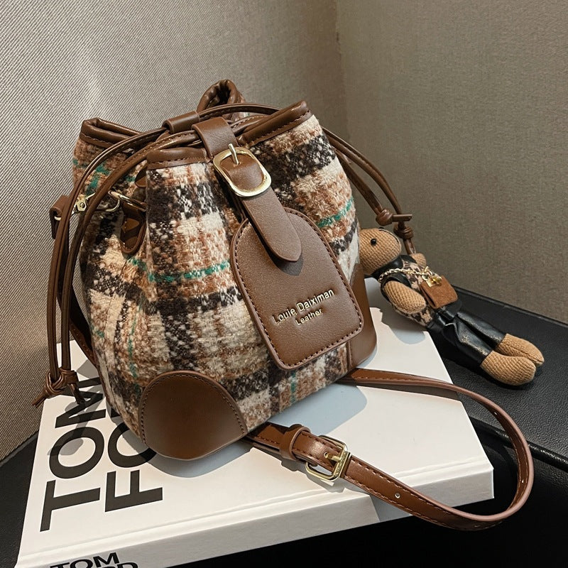IELGY women's vintage drawstring wide shoulder strap bucket messenger bag