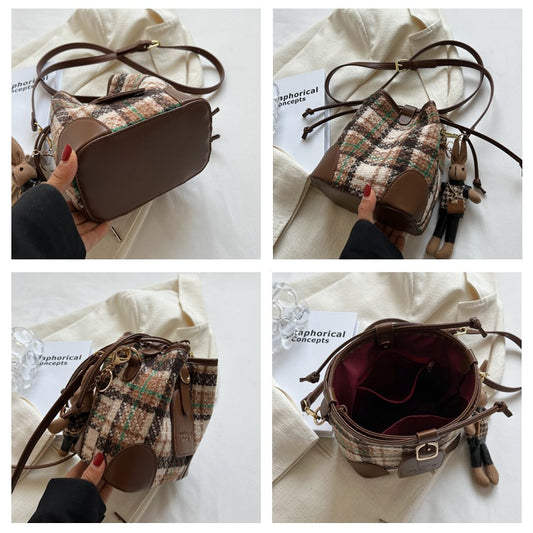 IELGY women's vintage drawstring wide shoulder strap bucket messenger bag