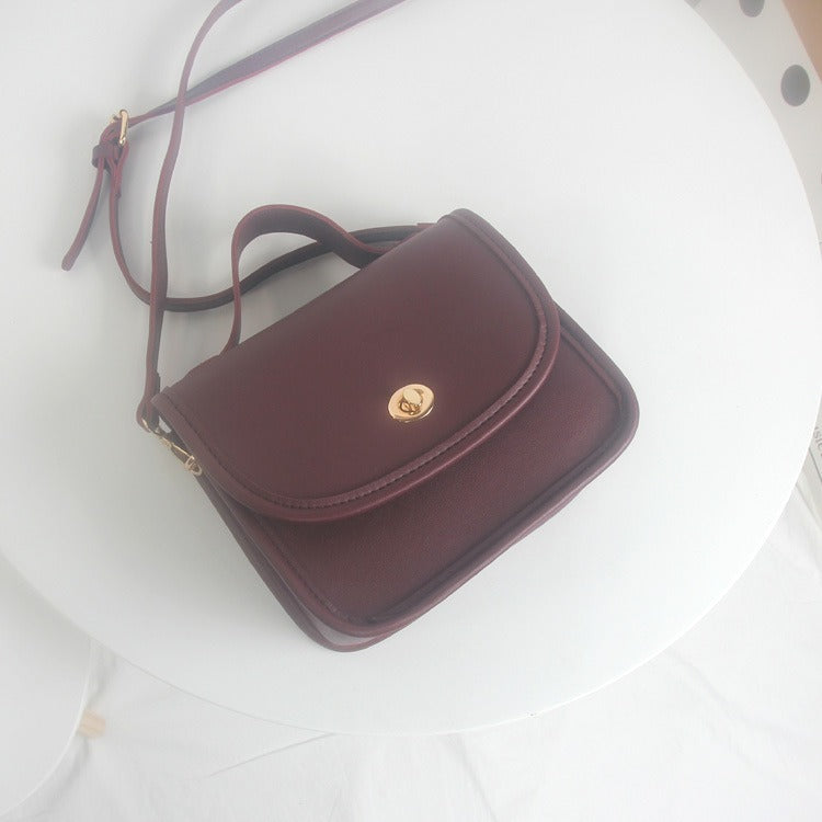 IELGY One shoulder Fashion Retro Black Simple Crossbody Women's bag Lock Portable