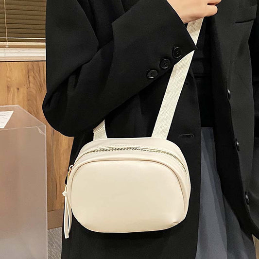 IELGY broadband Popular high-end oval smooth zipper woman's cute crossbody bag versatile one-shoulder