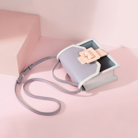 IELGY cross-body summer vitality High-class sense jelly bag fashion western style portable generous button exquisite style contrast color
