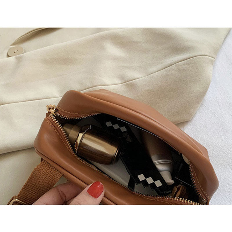 IELGY broadband Popular high-end oval smooth zipper woman's cute crossbody bag versatile one-shoulder
