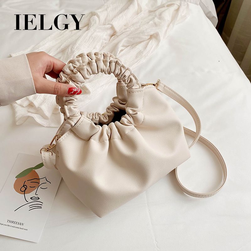 Plain color and retro fashion style handbag for women