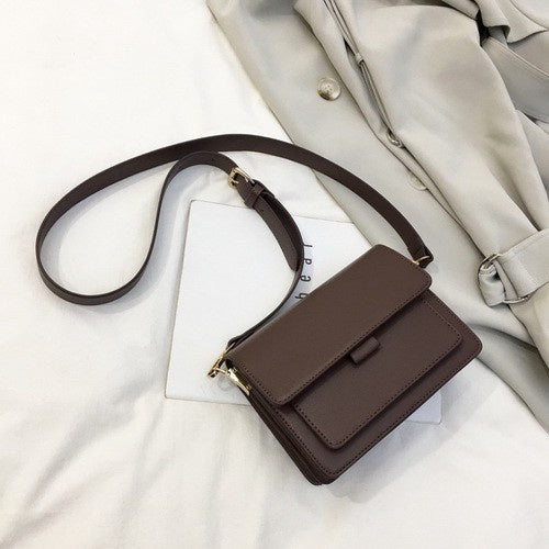 IELGY  Small square bag Messenger bag female simple retro bag senior sense of the wind and wind