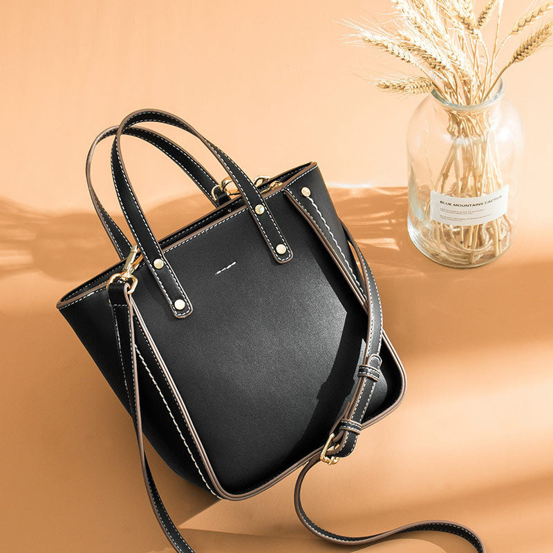 IELGY bucket Atmosphere street shoot rivet Handbag black Messenger Bag Small New Trendy Fashion