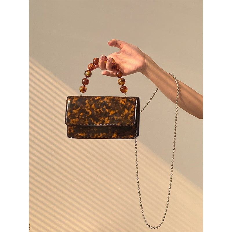 IELGY niche design retro fashion beaded chain messenger bag