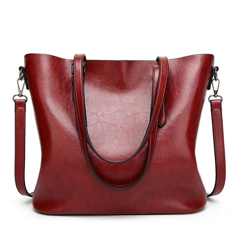 IELGY New spot handbags Simple shoulder slung women's bag