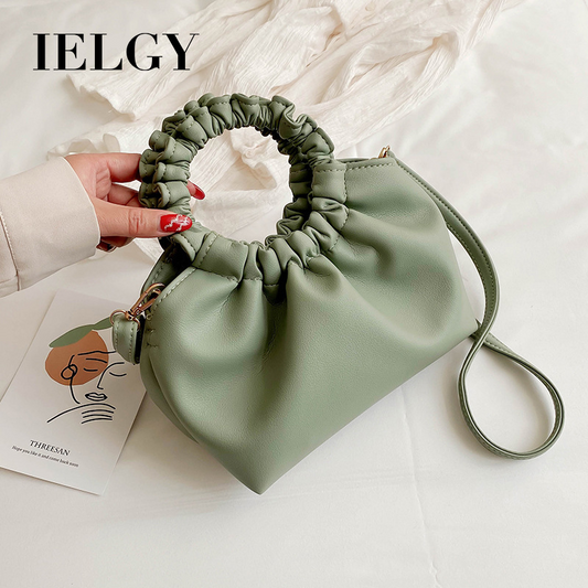 Plain color and retro fashion style handbag for women