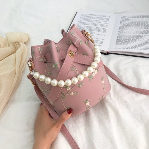 Small bag girl 2021 spring new fairy new lace embroidered bucket bag chain pearl shoulder slant satchel