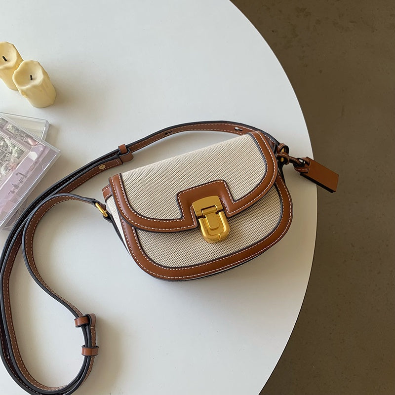 IELGY women's korean style stitching contrast color retro messenger saddle bag