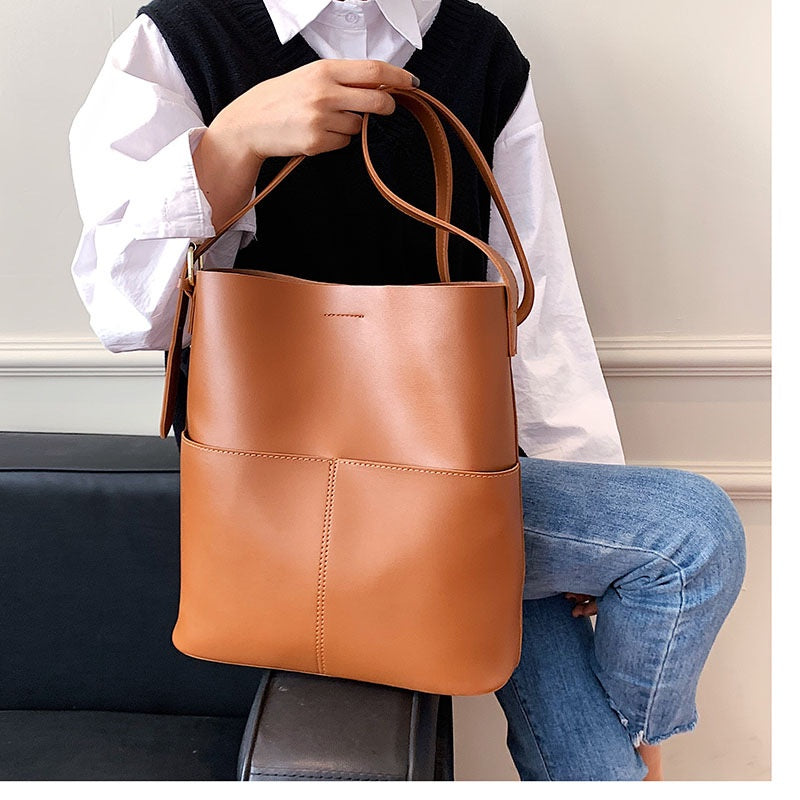 IELGY women's light luxury bucket messenger bag casual large capacity soft leather