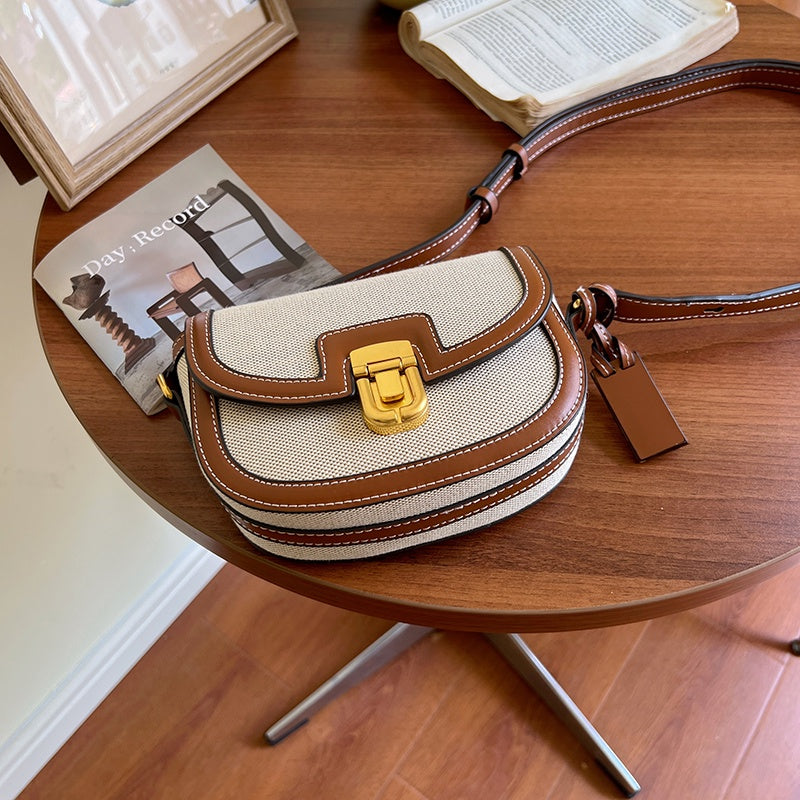 IELGY women's korean style stitching contrast color retro messenger saddle bag
