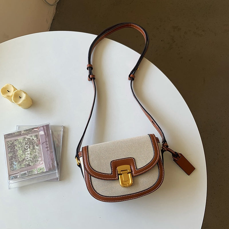 IELGY women's korean style stitching contrast color retro messenger saddle bag