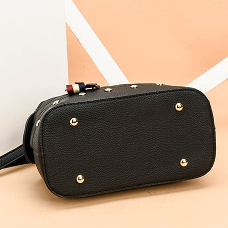 IELGY Korean style fashion rivet cartoon pendant messenger bag women