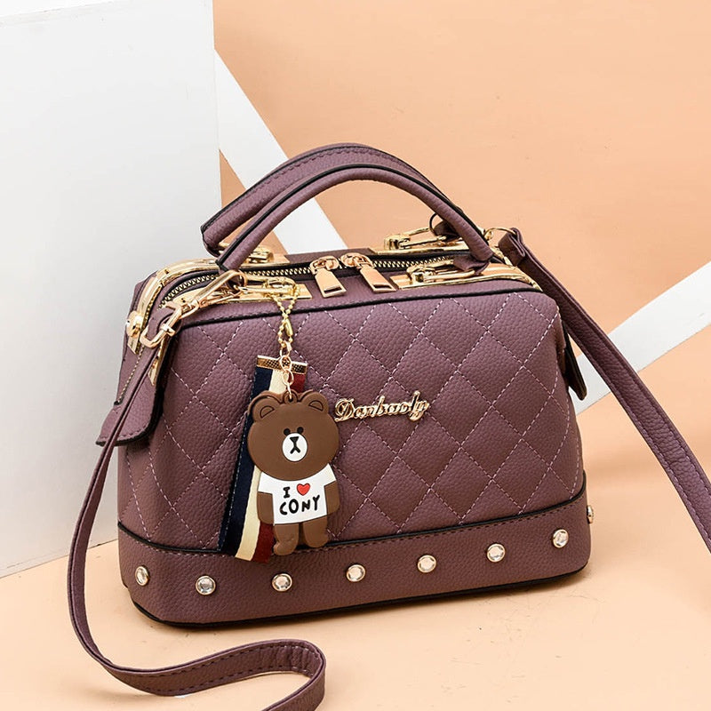 IELGY Korean style fashion rivet cartoon pendant messenger bag women